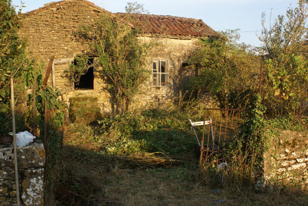 La Vieille Ferme in 2012, a roofless stone ruin open to the weather